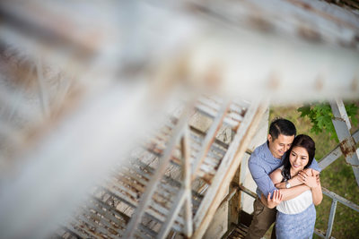 Queen's University, couple hugging on metal landing