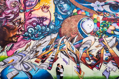 The Esplanade, graffiti wall, kissing couple