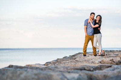 Couple Standing on Rocks at Sam Smith Park