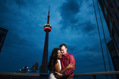 Embrace On A Rooftop by the CN Tower