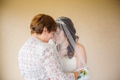 Bride and Mom Touching Foreheads in Silent Moment