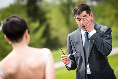 Groom Wiping Tears At The First Look