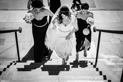 Bride and Bridesmaids Walking Up To The Church