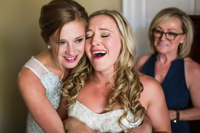 Bride Crying After Hugging With Bridesmaid