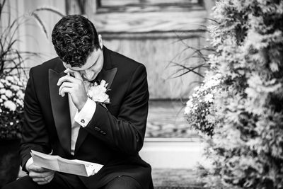 Groom Wiping Tears Away After Reading Letter From Bride