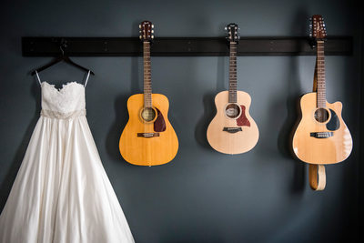 Wedding Dress Hanging With Guitars