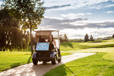 Wedding Couple in Golf Cart at Nobleton Lakes Golf Club