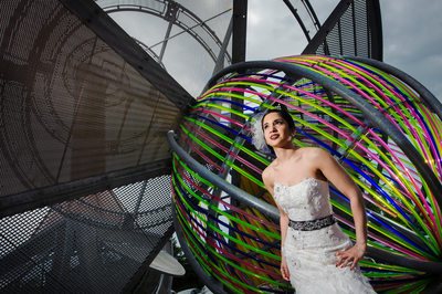 Sassy Bride at Distillery District Next to Sculpture