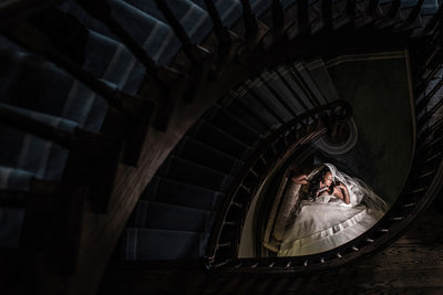 Bride at the Bottom of a Staircase