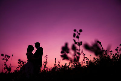 Bride and Groom Silhouette in Fields of West Lake