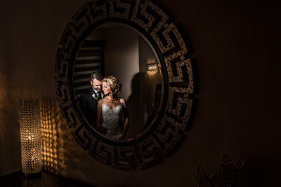 Couple Reflection in the Mirror on Wedding Day