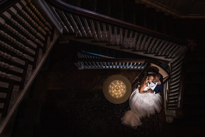 Couple at Bottom of the Stairs at Graydon Hall Manor