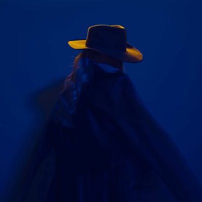 stylized portrait country girl with cowboy hat