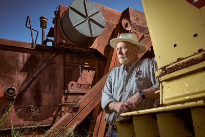 Farmer with Combine Harvester
