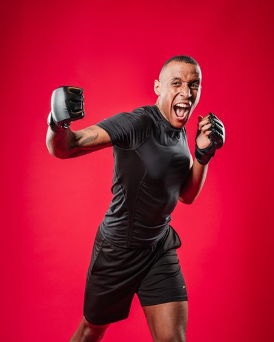 boxer training on red background