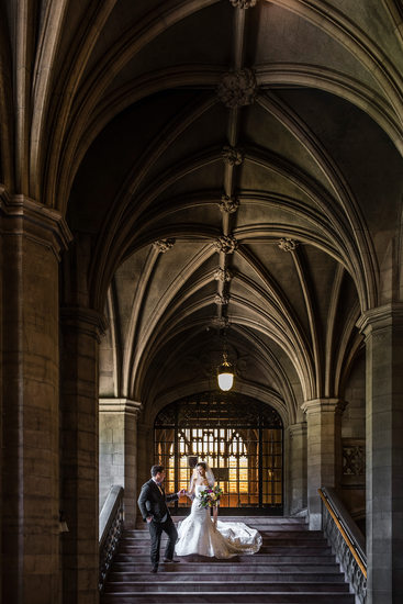 Bride and Groom Walking Down Stairs at Knox Collage