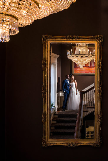 Bride and Groom in Mirror at Graydon Hall Manor