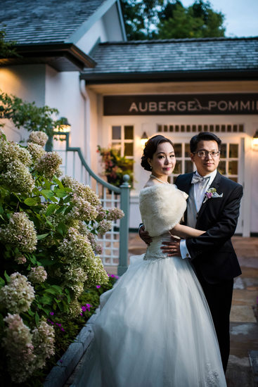 Bride and Groom Outside of Auberge du Pommier