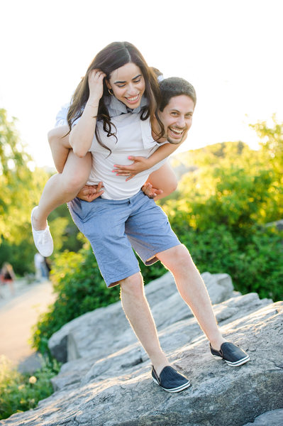 Port Credit session, man carries fiance over rocks