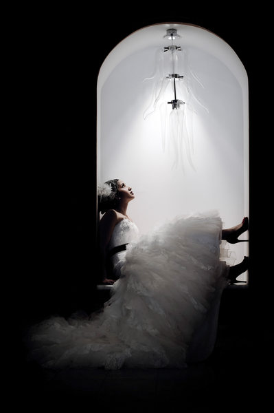 Bride with High Heels in Alcove of Novotel Hotel