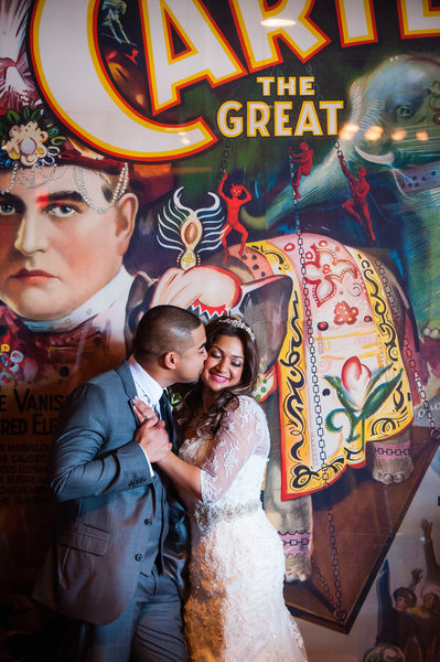 Couple Kissing In Front of Carter The Great Poster