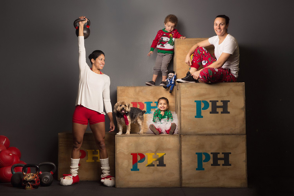 family crossfit holiday photo with dog