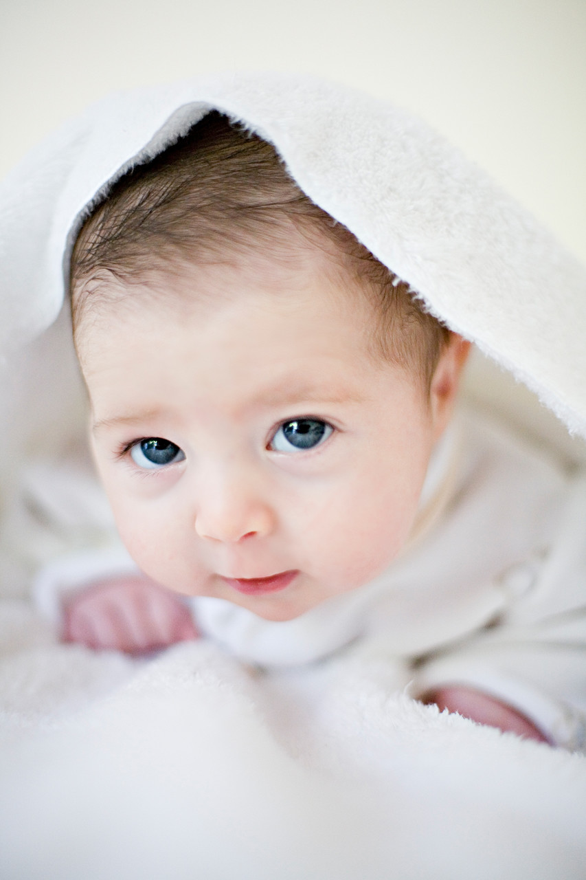 baby-under-white-blanket
