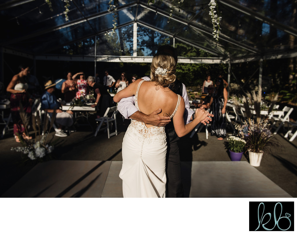 Bride and Father dance in tent