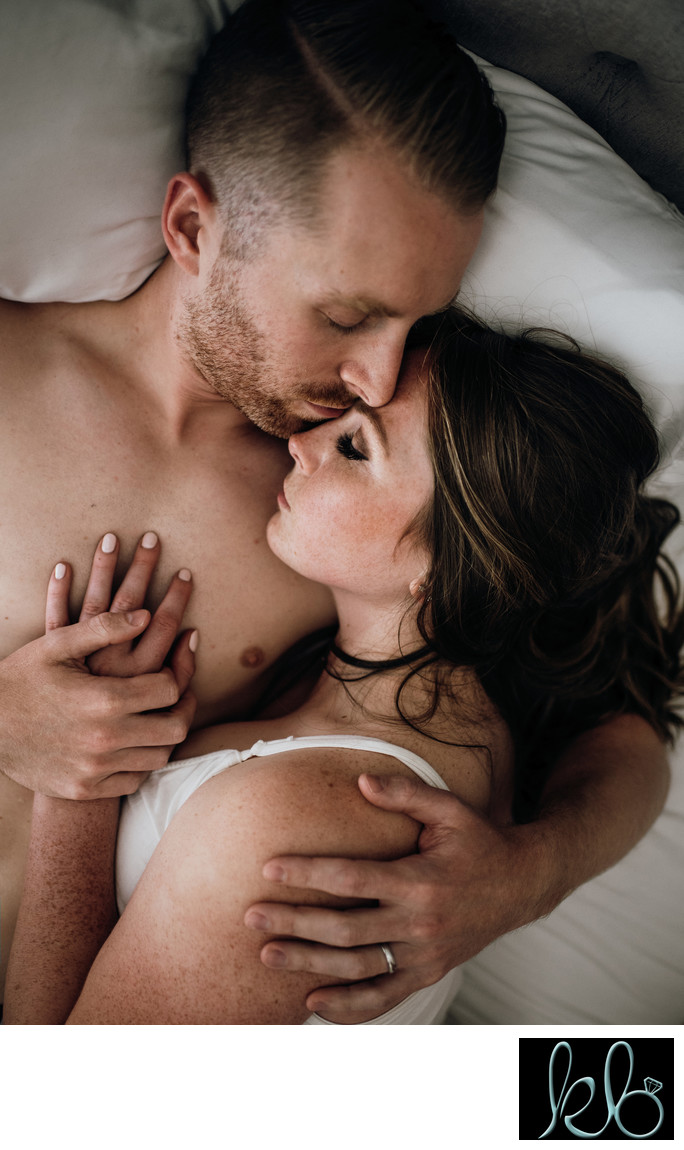 In Home Engagement Session of Couple in Bed