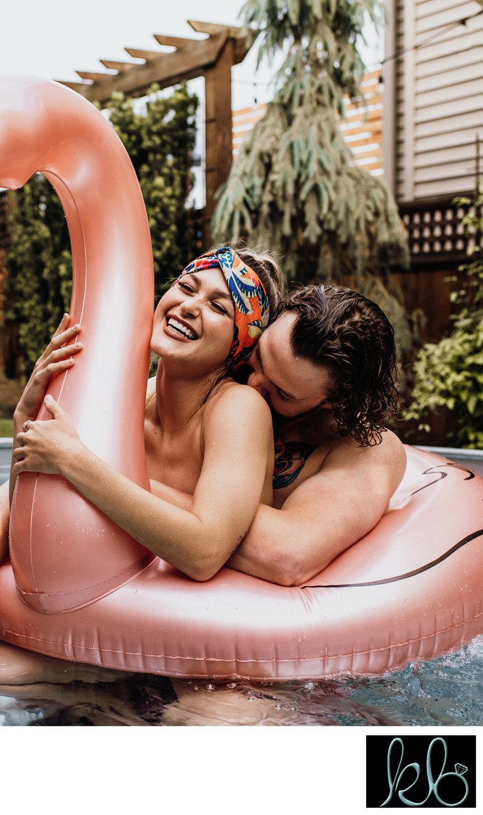 Lifestyle Couple Shoot in Pool with Inflatable Flamingo