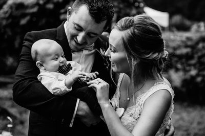 Bride, Groom and Their Baby At Lantzville Wedding