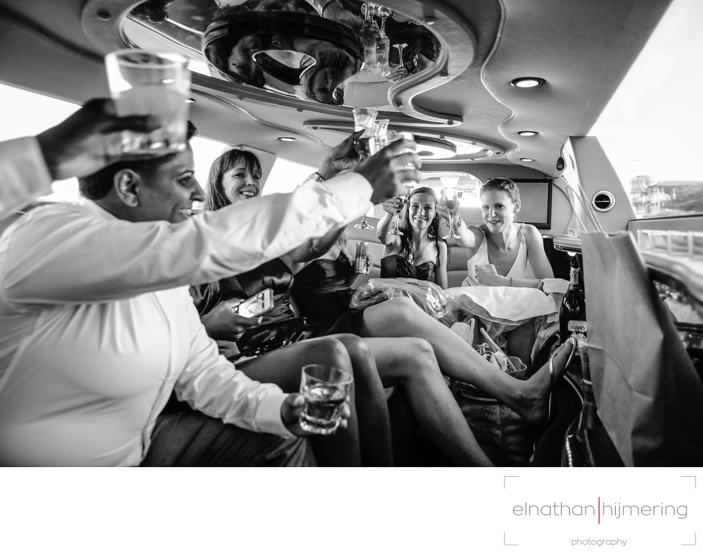 wedding party limo champagne cheers