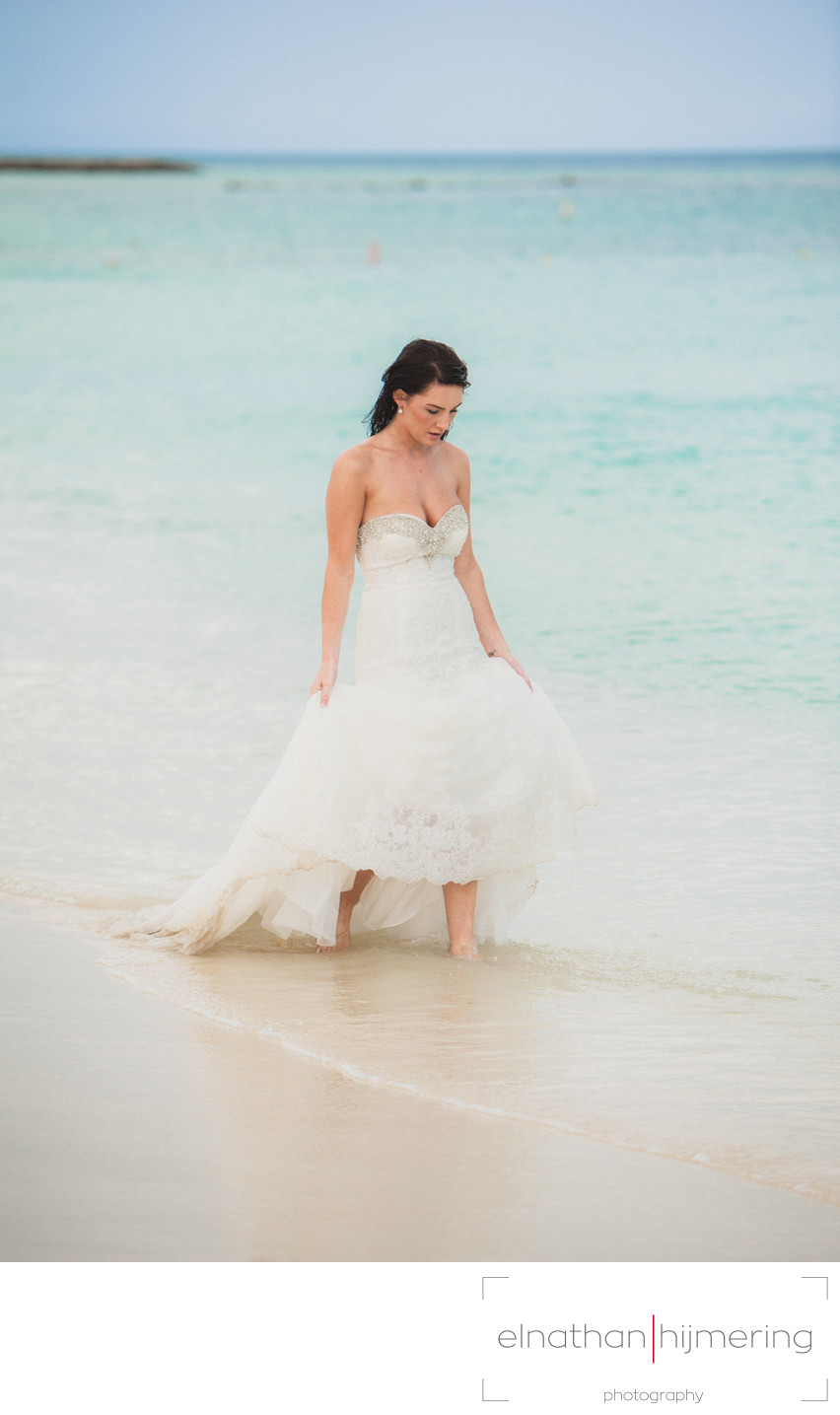 bride walking in water trash the dress