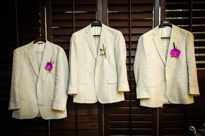groom and groomsmen coat hanging