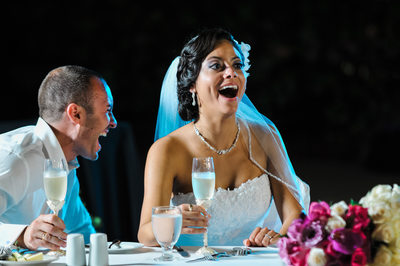 bride stunned groom laughing