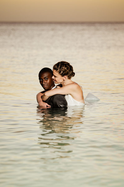 gay couple in water looking