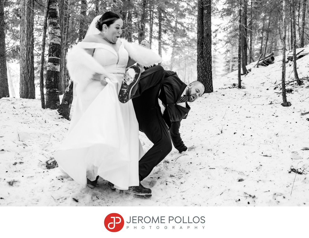 Groom Slips On Snow Elkins Resort Wedding