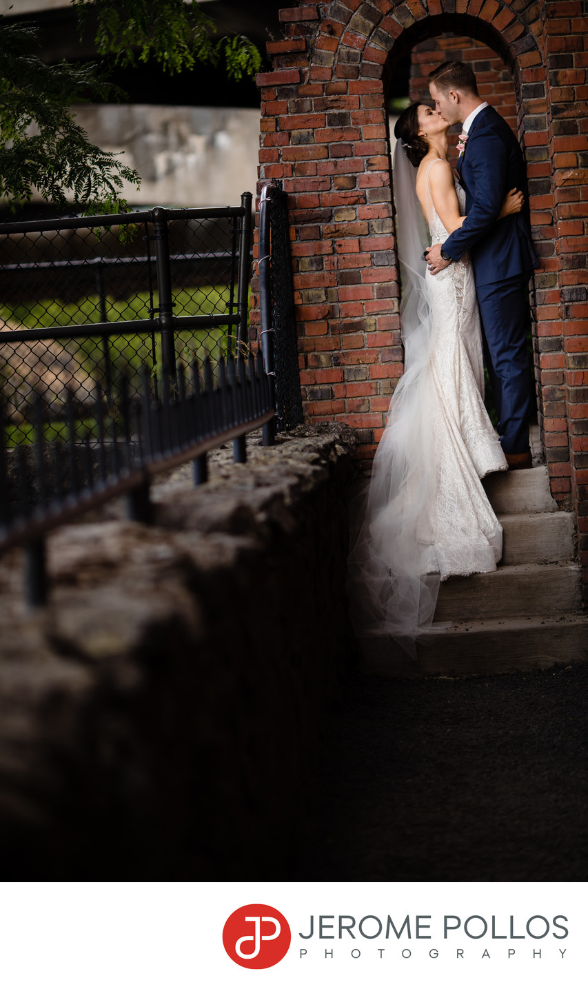 Bride Groom Kiss Brick Archway Spokane Washington