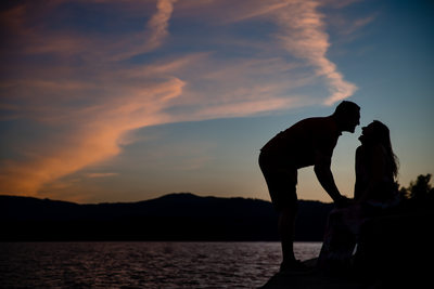 Sunset Lake Coeur d'Alene Kiss Engagement Portrait