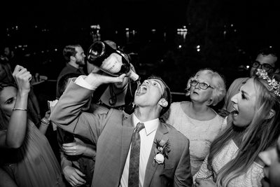 Groom Chugs Champagne Post Falls Wedding Reception