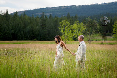 Bride And Groom Sagle Idaho Wedding Field Walk