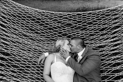 Bride Groom Elkins Resort Wedding Hammock Kiss