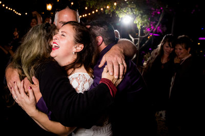 Bride Hugged By Family Carmel California Wedding