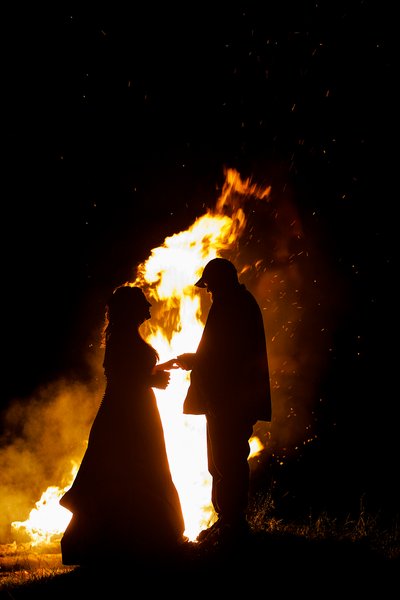 bonfire wedding moment between bride and father