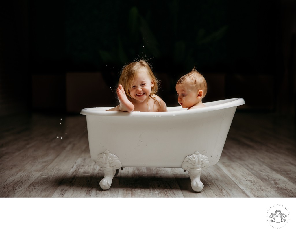 giggles at bath time portrait session