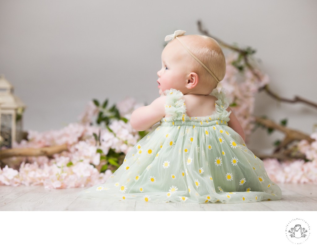 Charming baby portrait with wildflowers