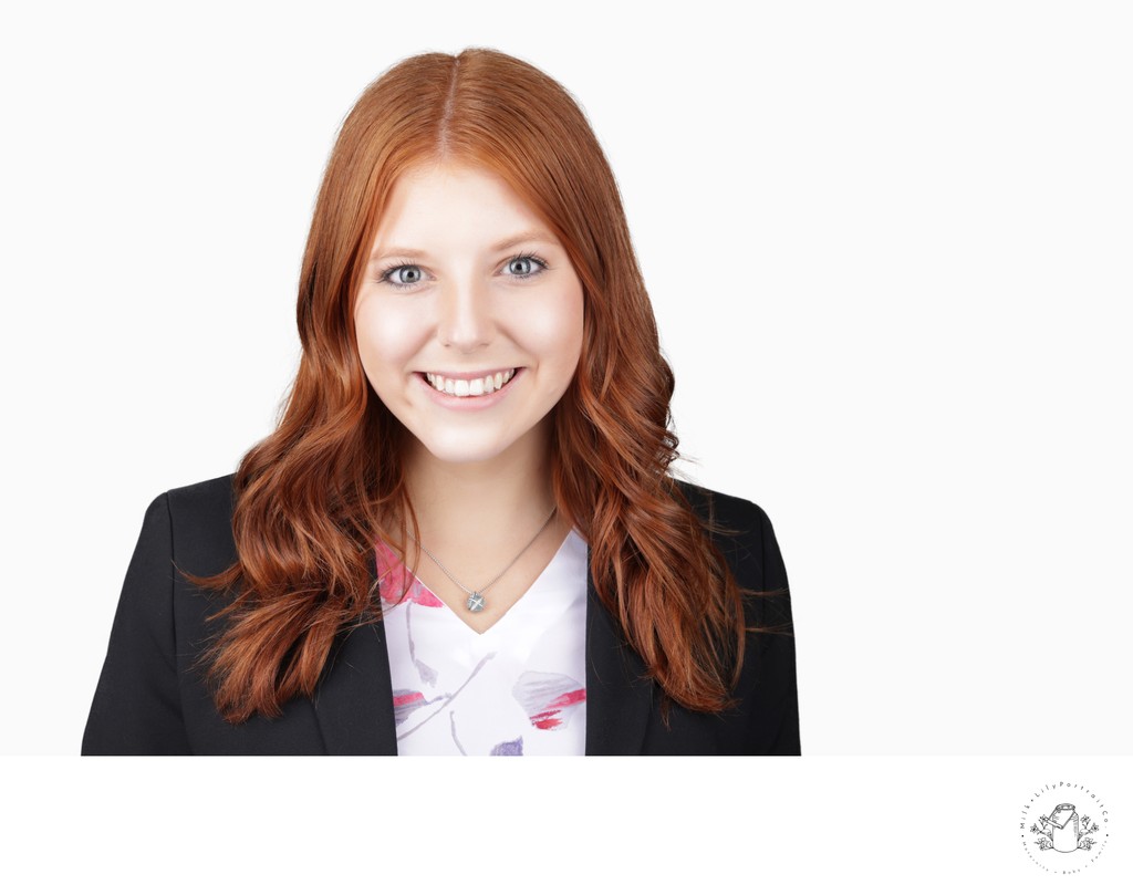 Red headed IT Specialist Headshot