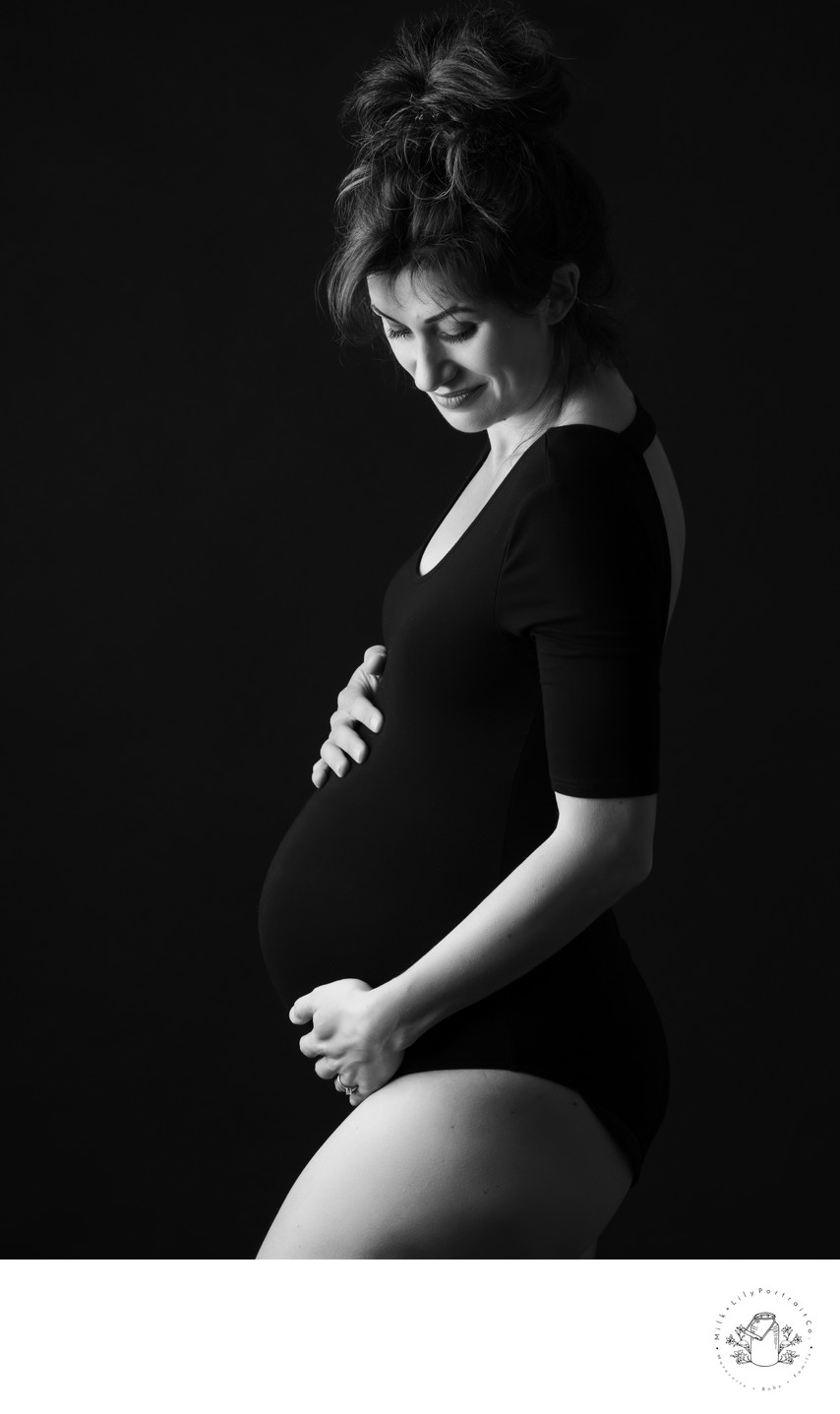 black and white studio maternity portrait