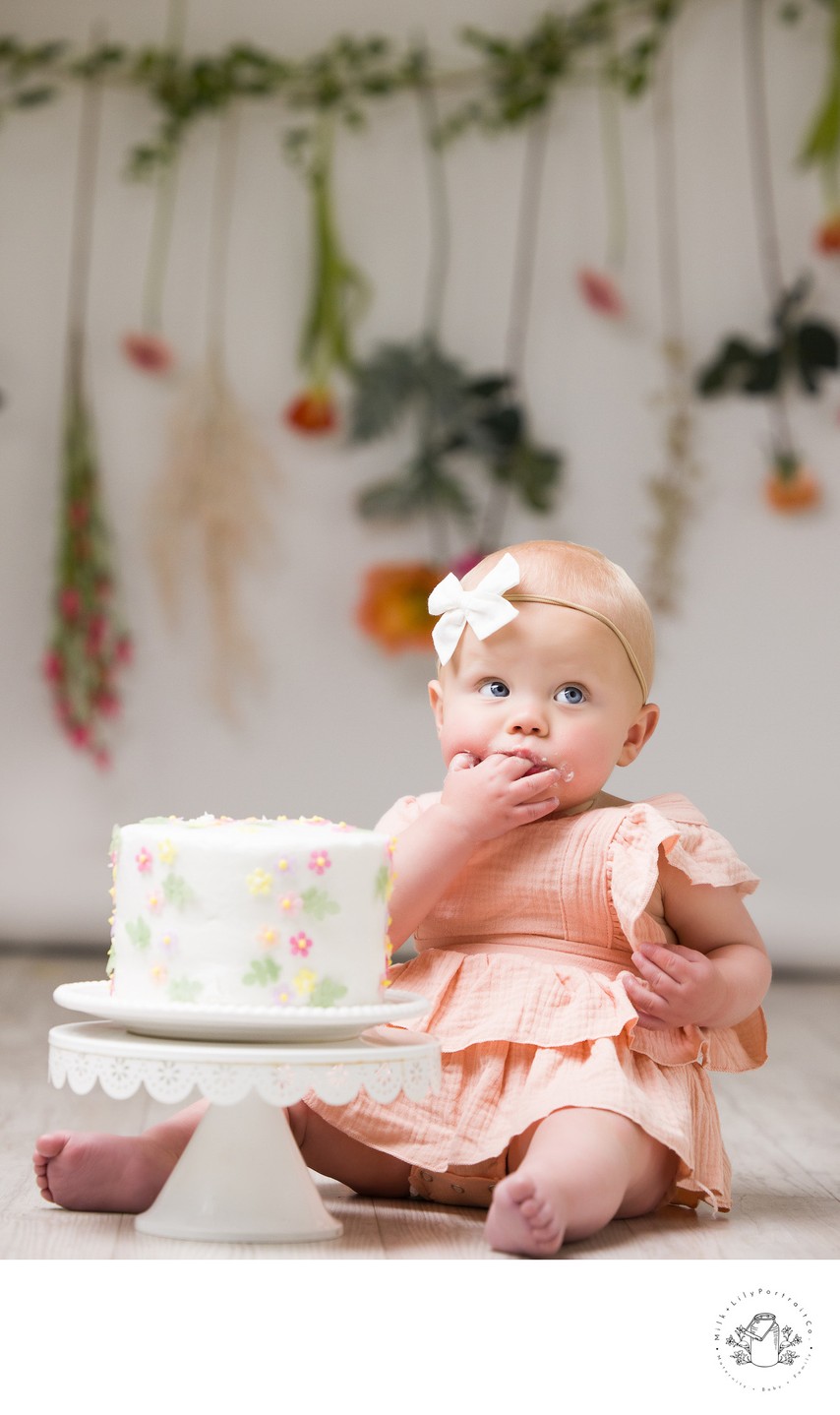 Adorable baby portrait with vibrant wildflowers