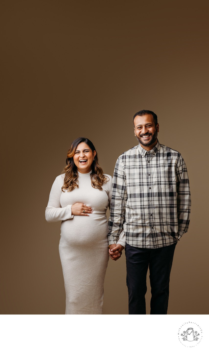 In studio couple's maternity session